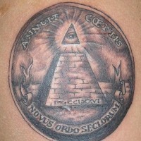 Dollar eye pyramid tattoo