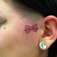 Red little bow face tattoo