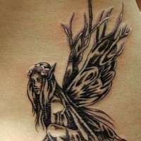 Black and white forest fairy tattoo