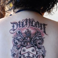 Family coat of arms tattoo on back