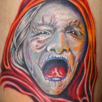 strega in mantello rosso tatuaggio