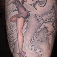 Naked woman cherub and spade tattoo