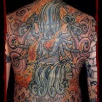 Surreal deity full back tattoo