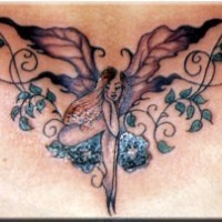 Fairy with tracery coloured tattoo