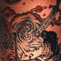 Tatuaje de un barco con una mujer y la muerte