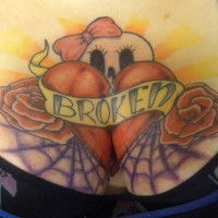 Broken heart with roses and web on chest
