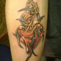 Heart in flame tribal tattoo