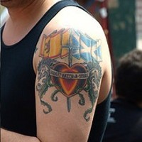 Spain and scotland flags heart tattoo