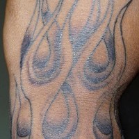 Colorless, cathing similar waves flames hand tattoo