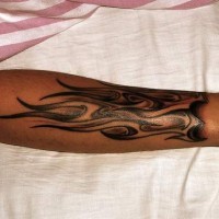 Long flames arm tattoo