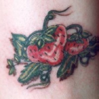 Red flower in black dot tattoo