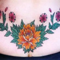 Colourful flowers tattoo on tail base