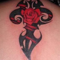 Red rose in black tribal tattoo