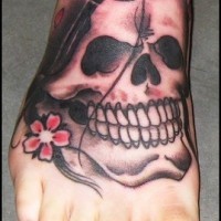 Skull damned if I do foot tattoo