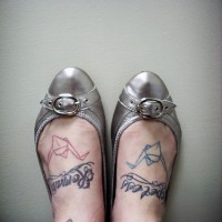 Hopeless roman-woman's inscription  foot tattoo
