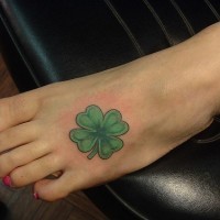 Little green patrick's day leaf foot tattoo