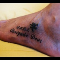 Ciphered inscription and full name foot tattoo