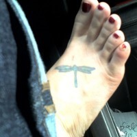 Thin colourful accurate dragonfly foot tattoo