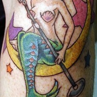 Mermaid-singer, sitting on the moon forearm tattoo