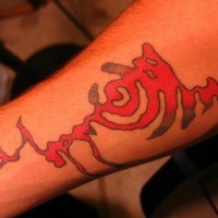 Red image, piece of labyrinth forearm tattoo
