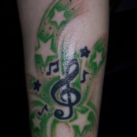 Green and dark blue star melody forearm tattoo
