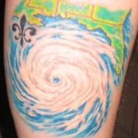 Colourful fragment of waterspout forearm tattoo