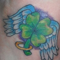 Green four leaf clover with angel wings tattoo