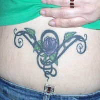 Girly flower and tribal tracery  tattoo