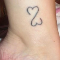 Lovers heart tattoo on leg