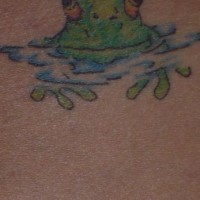 Frog looking from water tattoo