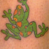 Green and orange frog tattoo