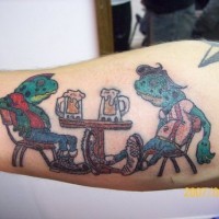 Frogs drinking beer on arm