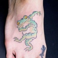 Nice dancing toad tattoo on foot