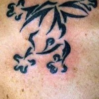 Tribal style frog tattoo