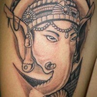 Ganesha black ink artwork tattoo