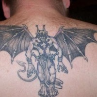 Humanised winged demon tattoo on back