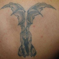 Winged gargoyle tattoo