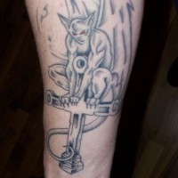 Gargoyle on cross black ink tattoo