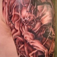 Realistic Gargoyle black ink tattoo on shoulder