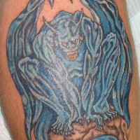 Angry blue Gargoyle tattoo