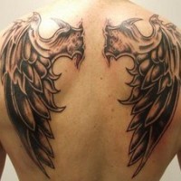Gargoyle wings tattoo on back