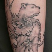 Gryphon with polar bear head tattoo