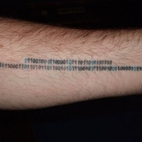 Binary code arm tattoo