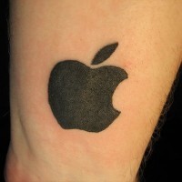 Black apple logo tattoo
