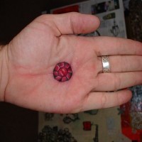Geek tattoo in colour on inner hand