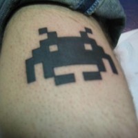 Eight bit space invaders black ink tattoo