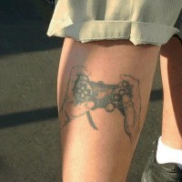 Hands with playstation 2 joystick tattoo
