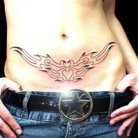 Flaming heart lower front tattoo