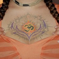 Elegant hindu lotus tattoo on chest