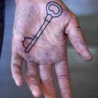 Long  one colorless key  hand tattoo